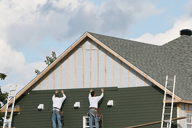 Professional Siding Installation technician working in McKees Rocks, PA